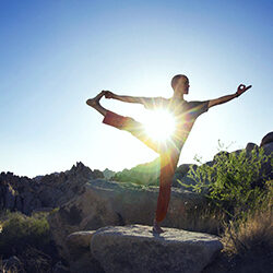 Red Mountain Sedona - Young adult male practicing yoga and in recovery at aftercare program